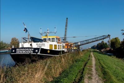 Dijkstabilisatie met gebruik van een zandsproeimethode